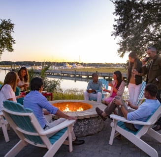 group of people around a firepit