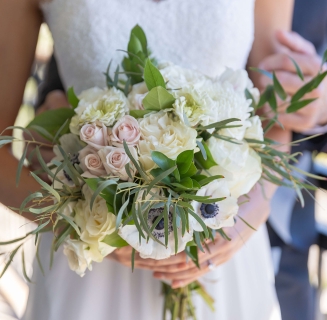 bouquet of flowers being held by a bride