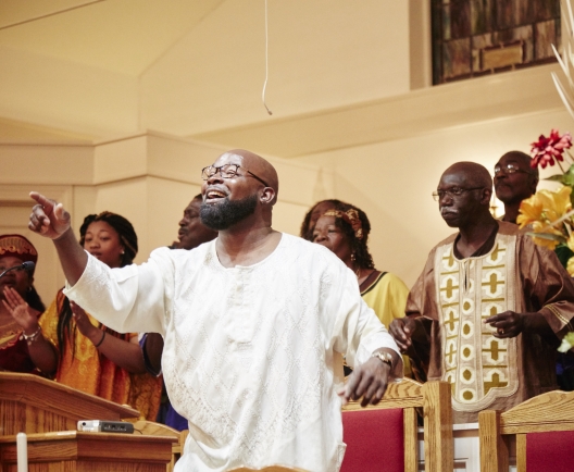 group of people singing in a choir
