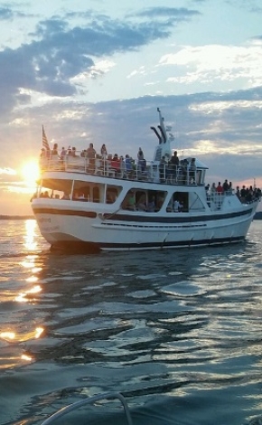 Boat on the water with people on it