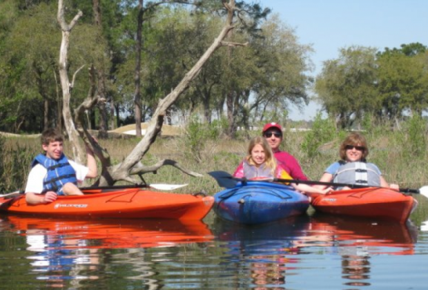 Family kayaking together