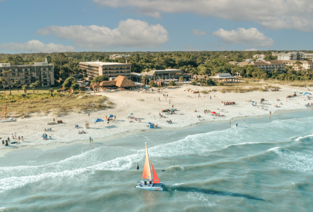 BHHHI Beach and Resort Aerial with Sailboat