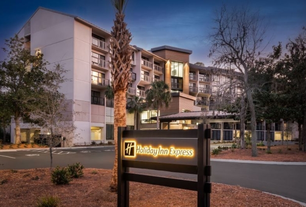 Holiday Inn Express sign lit up at night time