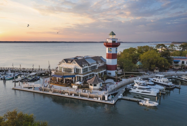 Quarterdeck venue nestled on the water near a lighthouse