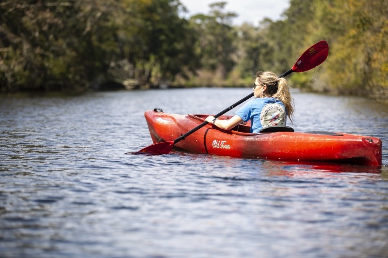 A woman kayaking 